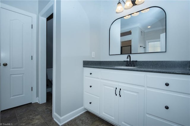 bathroom with toilet and vanity