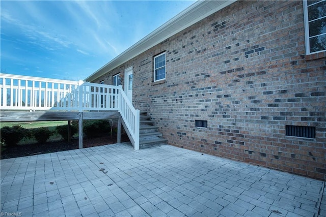 view of patio featuring a wooden deck