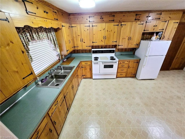 3015 S NC Highway 87, Graham, NC 27253 - kitchen with white appliances, a sink, and brown cabinetry