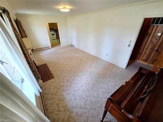 3015 S NC Highway 87, Graham, NC 27253 - carpeted empty room with baseboards, ornamental molding, and a baseboard heating unit