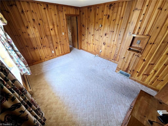 3015 S NC Highway 87, Graham, NC 27253 - unfurnished room with carpet flooring, wood walls, and baseboards
