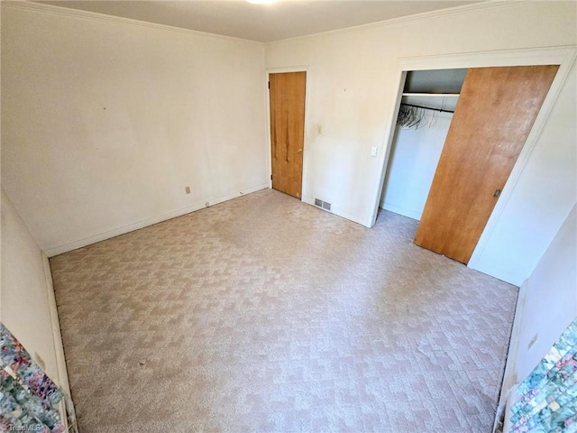 3015 S NC Highway 87, Graham, NC 27253 - unfurnished bedroom with crown molding and a closet