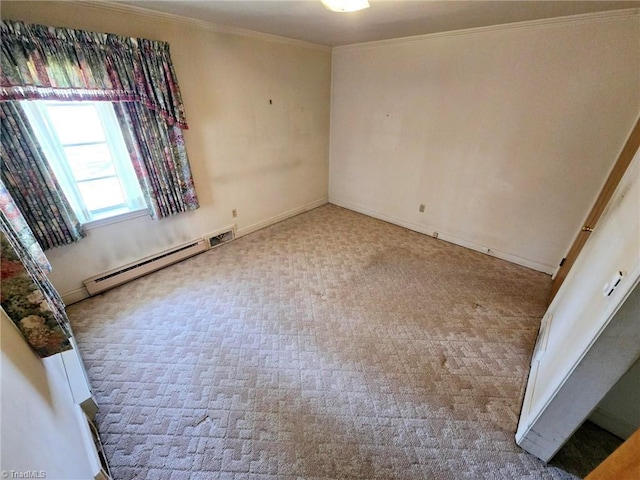 3015 S NC Highway 87, Graham, NC 27253 - unfurnished room with a baseboard heating unit, crown molding, carpet flooring, and baseboards