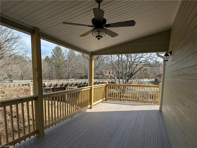 wooden terrace with a ceiling fan