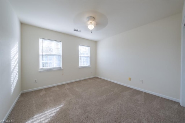 unfurnished room featuring carpet floors