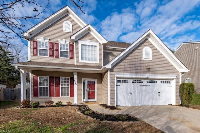 front of property with a garage