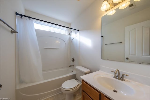 full bathroom with shower / bath combo, vanity, and toilet