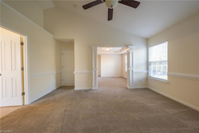 carpeted empty room featuring ceiling fan and high vaulted ceiling