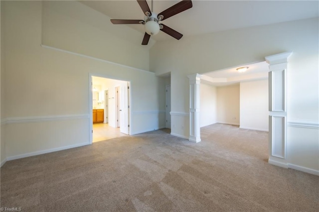 unfurnished room featuring light carpet, ceiling fan, and high vaulted ceiling