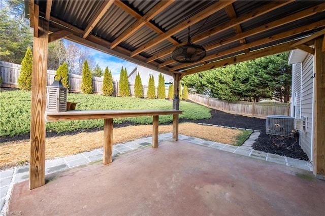 view of patio / terrace with central AC unit and ceiling fan