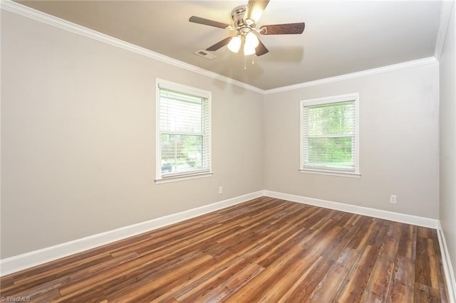 5170 Sunrise Ter, Winston-Salem, NC 27105 - spare room featuring dark wood-style flooring, baseboards, ornamental molding, and plenty of natural light