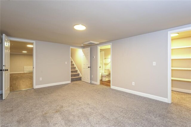 5170 Sunrise Ter, Winston-Salem, NC 27105 - finished basement featuring stairway, carpet, visible vents, and baseboards