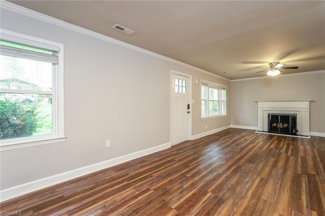 5170 Sunrise Ter, Winston-Salem, NC 27105 - unfurnished living room featuring visible vents, baseboards, dark wood-style flooring, ceiling fan, and crown molding