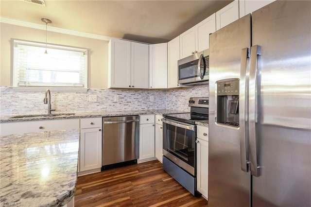 5170 Sunrise Ter, Winston-Salem, NC 27105 - kitchen with a sink, backsplash, dark wood-style floors, and stainless steel appliances