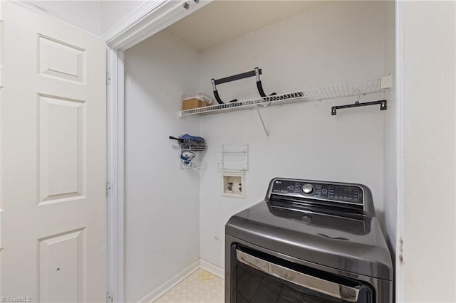 laundry area with washer / dryer, laundry area, and light floors