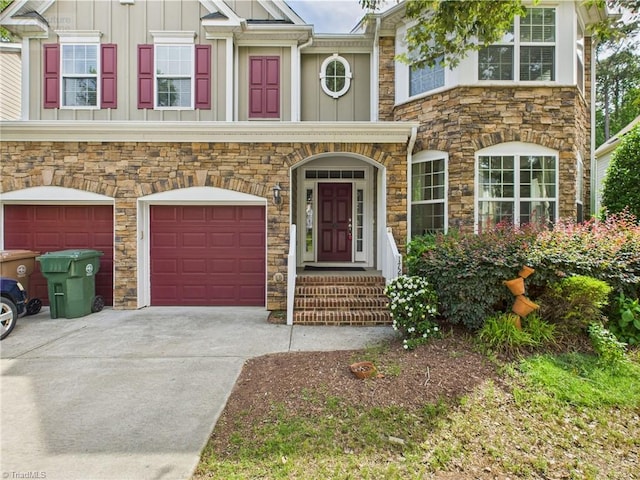 1728 Callandale Ave, Cary, NC 27518 - multi unit property featuring stone siding, board and batten siding, an attached garage, and concrete driveway