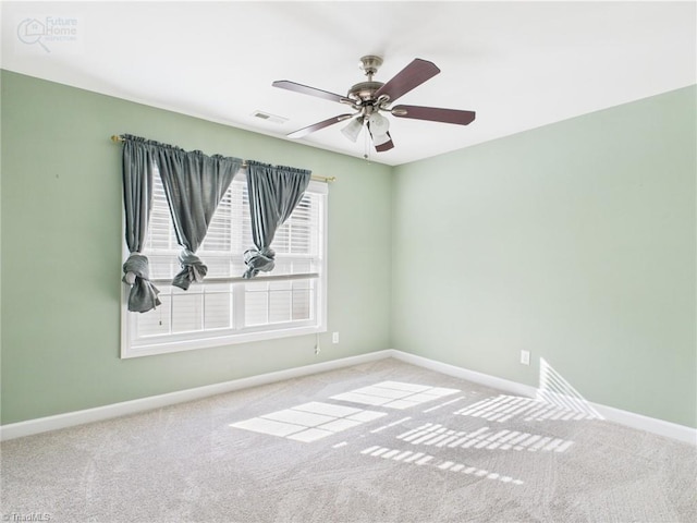 1728 Callandale Ave, Cary, NC 27518 - empty room featuring carpet floors, baseboards, and a ceiling fan