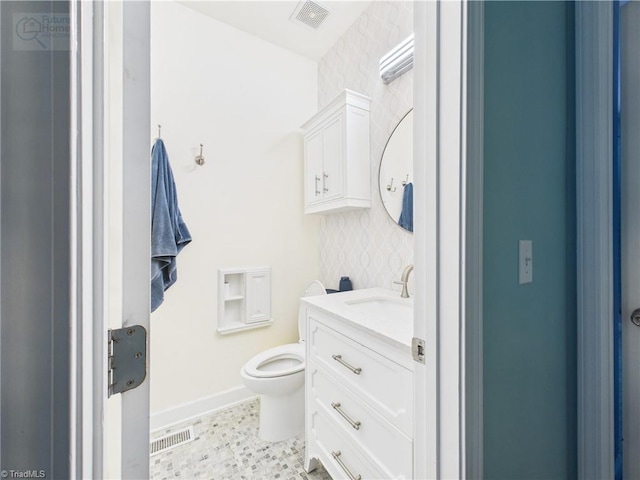 1728 Callandale Ave, Cary, NC 27518 - half bath featuring vanity, toilet, and baseboards