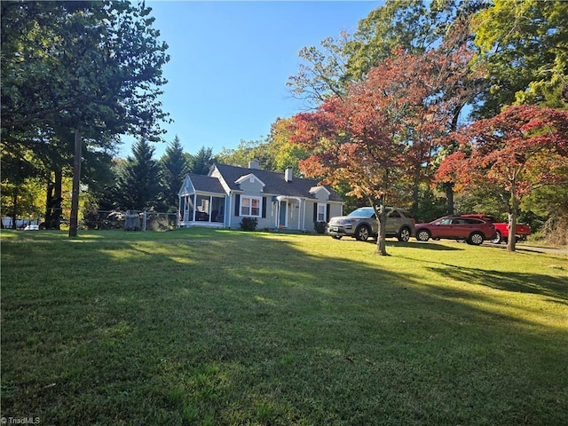 view of front of home with a front yard