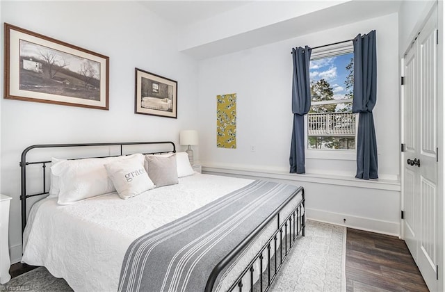 602 Shoreline Rd, New London, NC 28127 - bedroom featuring wood finished floors and baseboards
