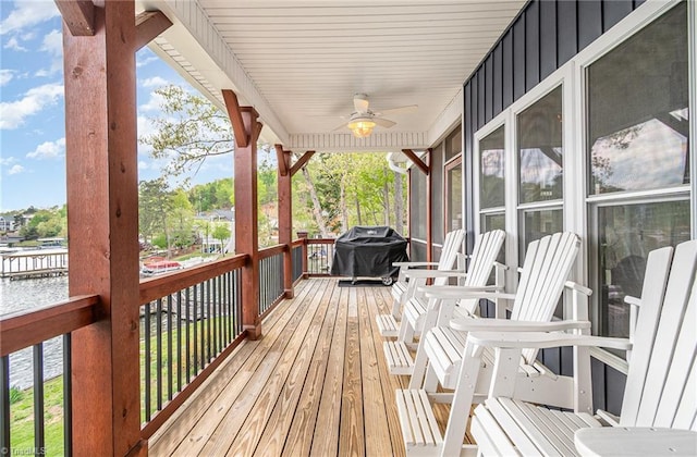 602 Shoreline Rd, New London, NC 28127 - deck with ceiling fan, a grill, and a water view