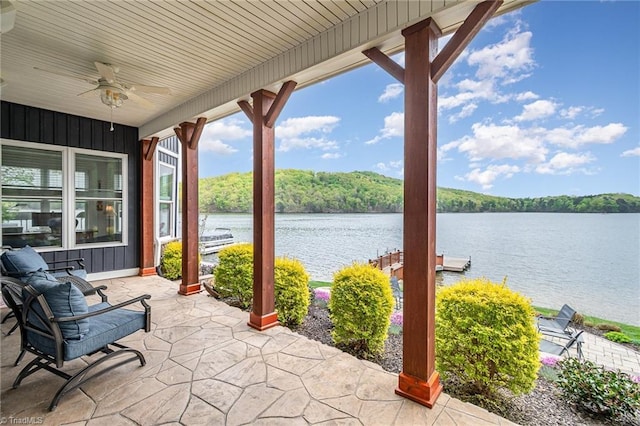 602 Shoreline Rd, New London, NC 28127 - view of patio with ceiling fan, a water view, and a wooded view