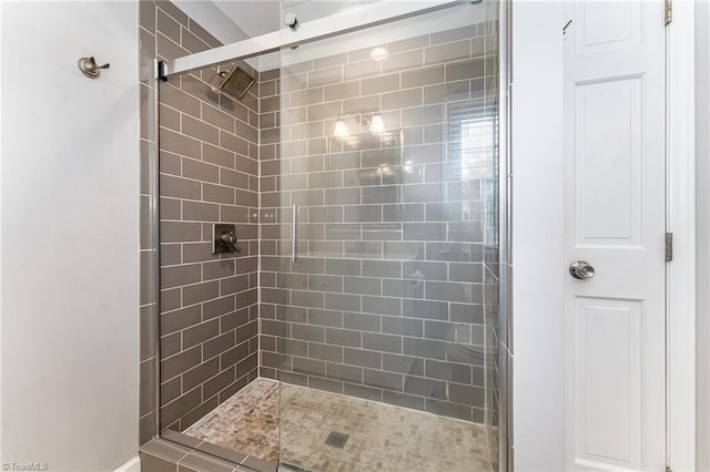 full bathroom featuring a stall shower