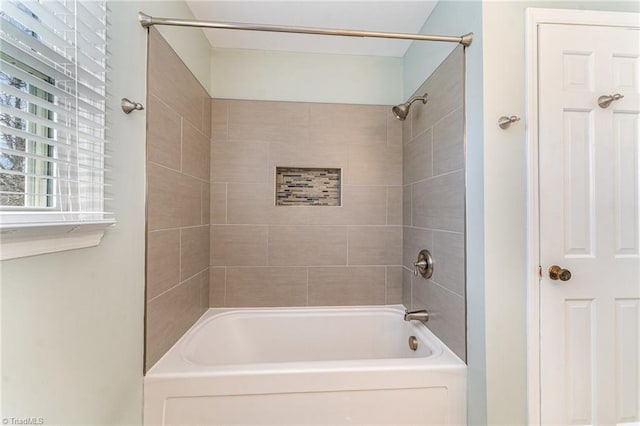 bathroom featuring  shower combination