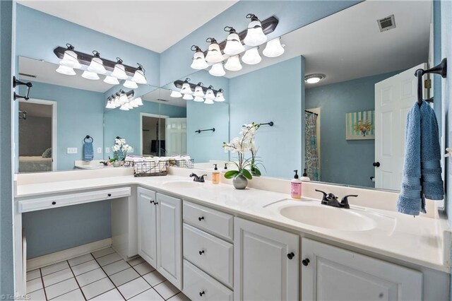 396 Bent Creek Trl, Kernersville, NC 27284 - bathroom featuring tile patterned flooring, double vanity, ensuite bathroom, and curtained shower