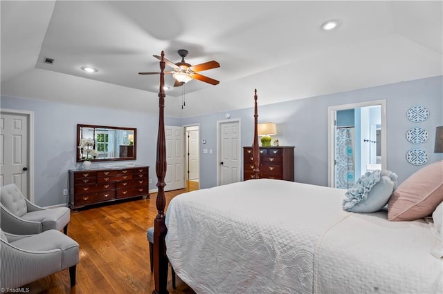 396 Bent Creek Trl, Kernersville, NC 27284 - bedroom with wood finished floors, lofted ceiling, recessed lighting, a ceiling fan, and ensuite bathroom