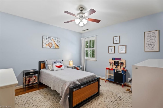 396 Bent Creek Trl, Kernersville, NC 27284 - bedroom with light wood finished floors and a ceiling fan