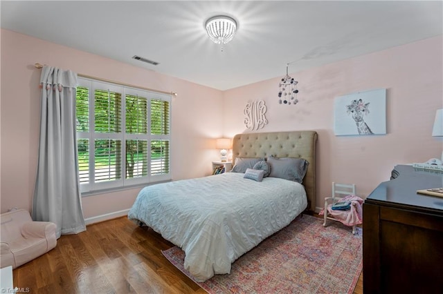 396 Bent Creek Trl, Kernersville, NC 27284 - bedroom featuring wood finished floors and baseboards