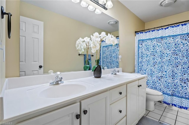 396 Bent Creek Trl, Kernersville, NC 27284 - bathroom with double vanity, tile patterned floors, and a shower with shower curtain