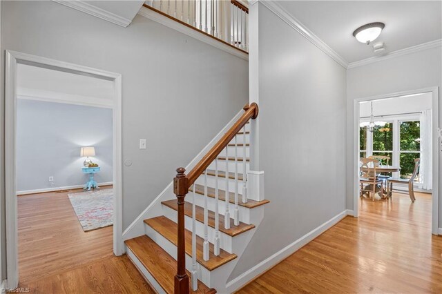 396 Bent Creek Trl, Kernersville, NC 27284 - staircase featuring crown molding and wood finished floors