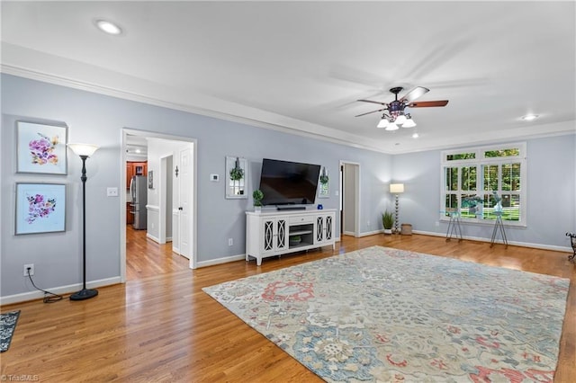 396 Bent Creek Trl, Kernersville, NC 27284 - living room with ceiling fan, crown molding, recessed lighting, and wood finished floors