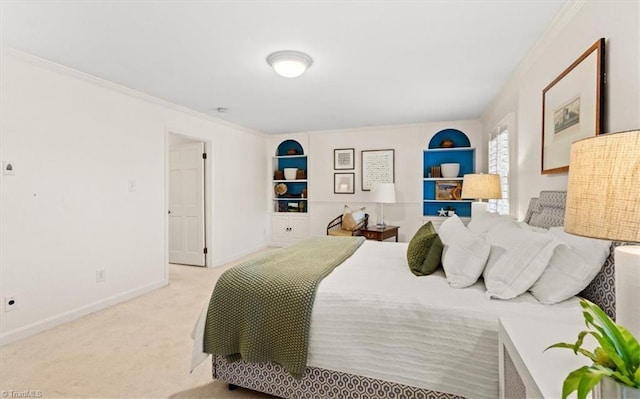 carpeted bedroom with ornamental molding