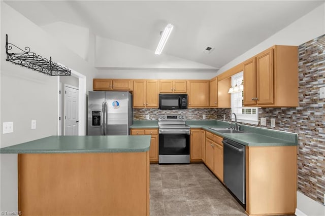 3931 Hickswood Forest Dr, High Point, NC 27265 - kitchen with appliances with stainless steel finishes, a sink, vaulted ceiling, backsplash, and a peninsula