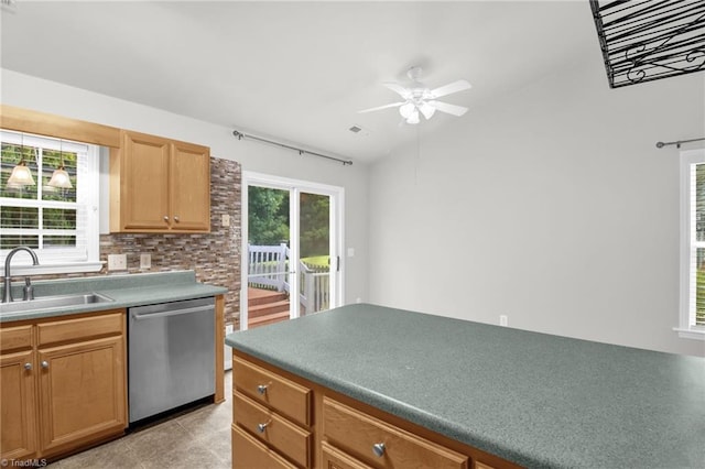 3931 Hickswood Forest Dr, High Point, NC 27265 - kitchen featuring stainless steel dishwasher, a sink, decorative backsplash, ceiling fan, and lofted ceiling