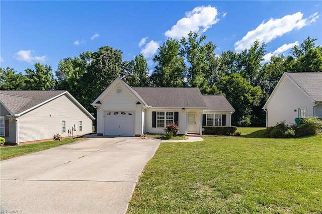 3931 Hickswood Forest Dr, High Point, NC 27265 - view of front of home with a garage, driveway, and a front yard