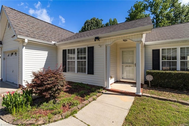 3931 Hickswood Forest Dr, High Point, NC 27265 - entrance to property with an attached garage and roof with shingles