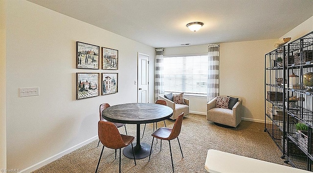 view of carpeted dining room