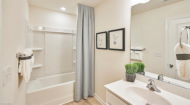 bathroom with vanity and shower / bath combination with curtain