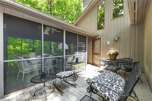 8009 Willow Glen Trl, Greensboro, NC 27455 - deck featuring a sunroom and outdoor dining area