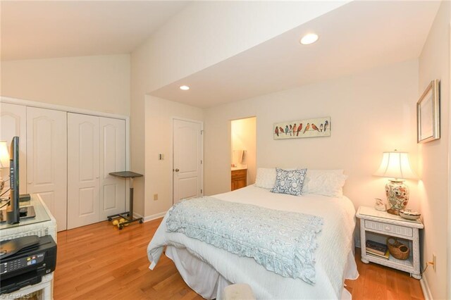 8009 Willow Glen Trl, Greensboro, NC 27455 - bedroom with lofted ceiling, light wood-style floors, a closet, recessed lighting, and baseboards