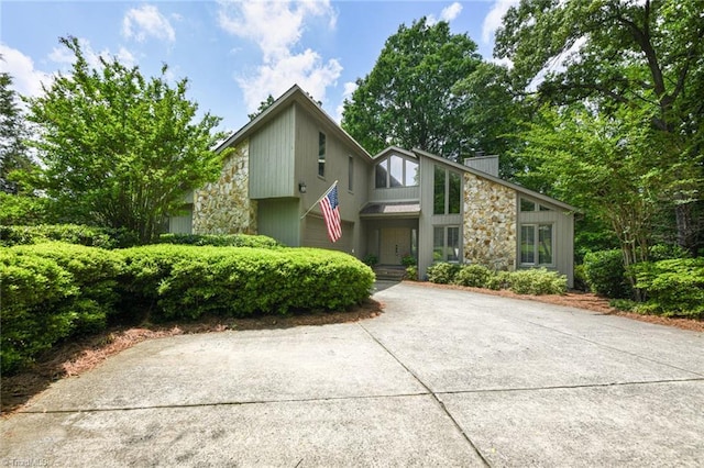 8009 Willow Glen Trl, Greensboro, NC 27455 - mid-century inspired home featuring stone siding