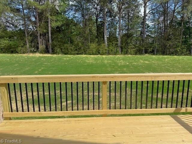 deck featuring a yard