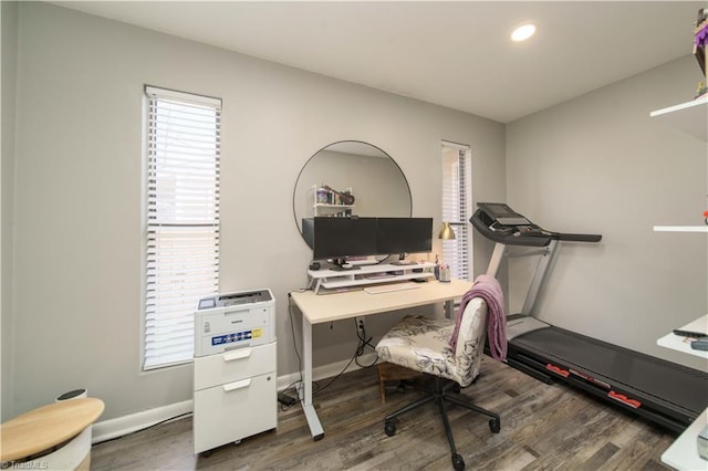 office space with wood finished floors, recessed lighting, and baseboards
