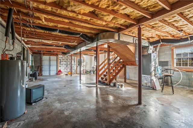 basement featuring water heater