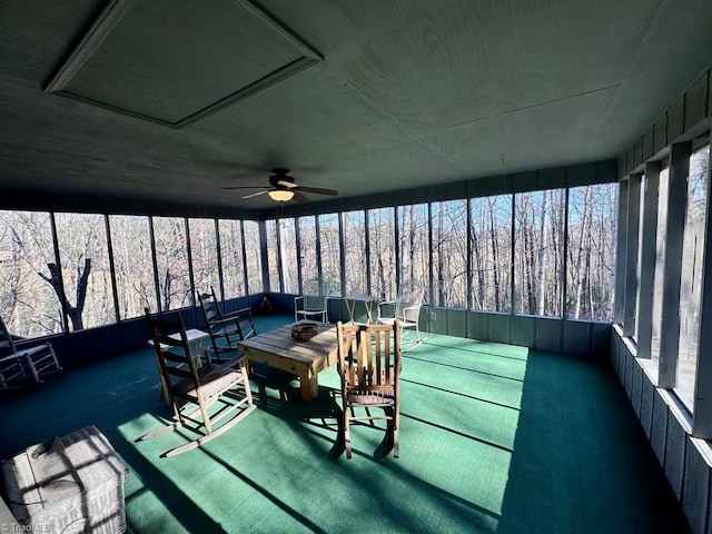 sunroom / solarium with ceiling fan