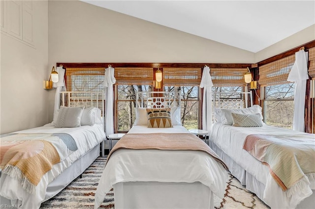 bedroom featuring vaulted ceiling